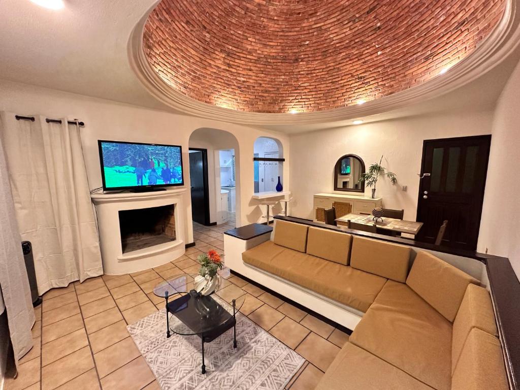 TV a/nebo společenská místnost v ubytování Central Petit Apartment