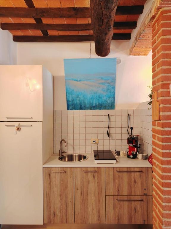 Kuchyň nebo kuchyňský kout v ubytování Claudia's Home La Suite