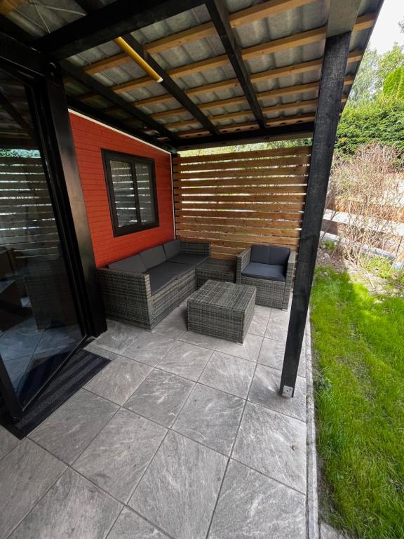 Posezení v ubytování Ferienhaus Zeulenrodaer Meer
