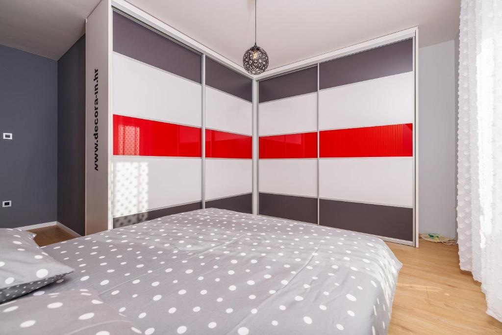 Postel nebo postele na pokoji v ubytování Apartments Hana