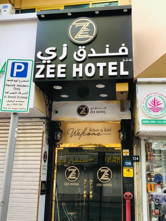 a store front of a zebra hotel with a sign on it at Zee Hotel in Dubai