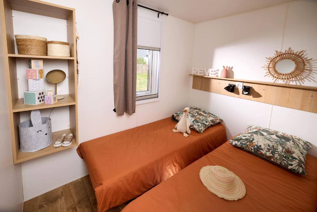 Postel nebo postele na pokoji v ubytování Eco-Lodge Lou Pantaï