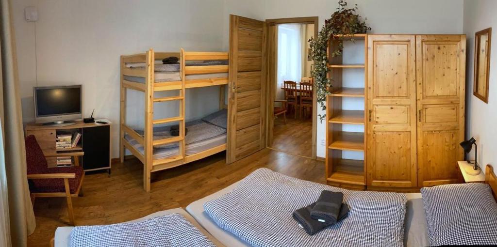 Postel nebo postele na pokoji v ubytování Apartmány Pekárna