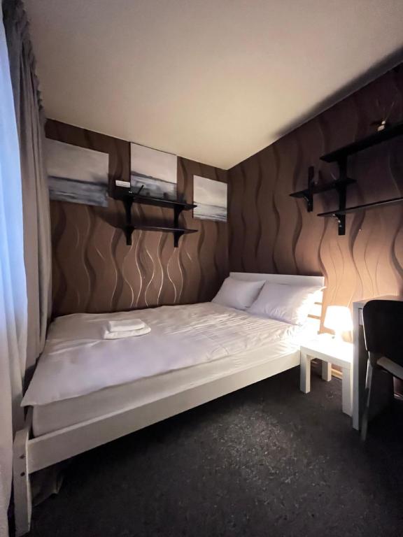 Posteľ alebo postele v izbe v ubytovaní Girls Hostel