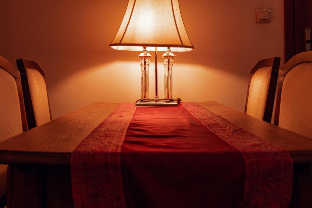 Postel nebo postele na pokoji v ubytování Hotel Ambasada Bolesławiec