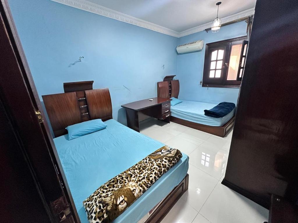 Postel nebo postele na pokoji v ubytování Misr Al Gadedah Rooms