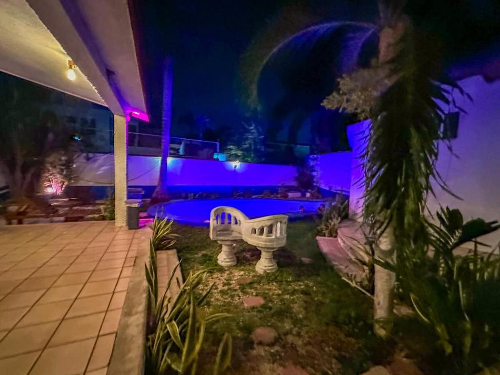 Bazén v ubytování Hermoso loft en colonia campestre para 2 personas nebo v jeho okolí