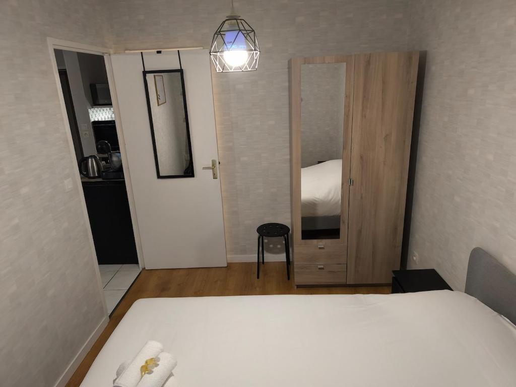 Postel nebo postele na pokoji v ubytování Douce Escale