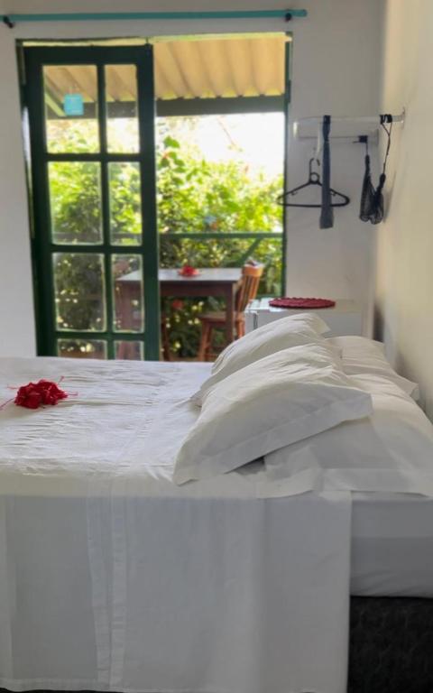 En eller flere senge i et værelse på Casa de Samuel Lobritis