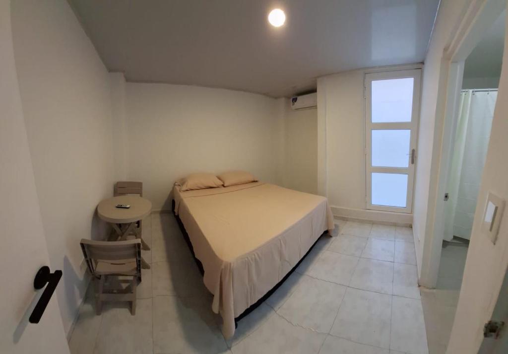 Postel nebo postele na pokoji v ubytování Jhonny Cay Collection Apartahotel