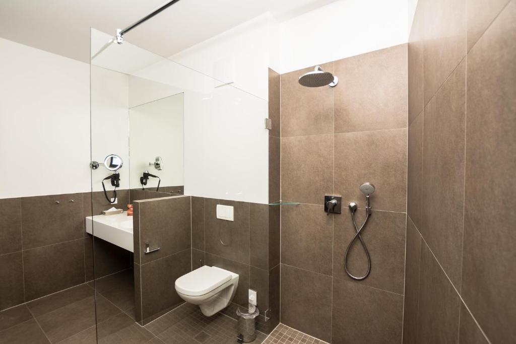 Koupelna v ubytování Stadthotel Reich