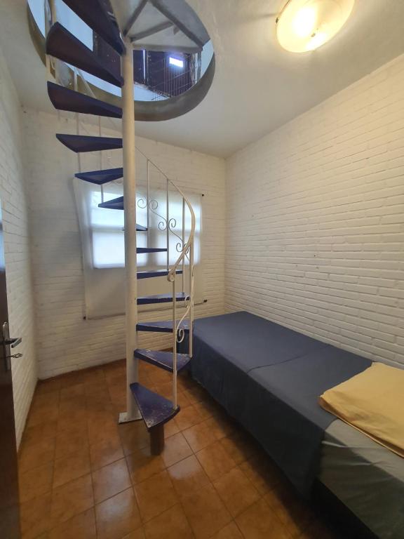 Postel nebo postele na pokoji v ubytování Pepa Kingdom