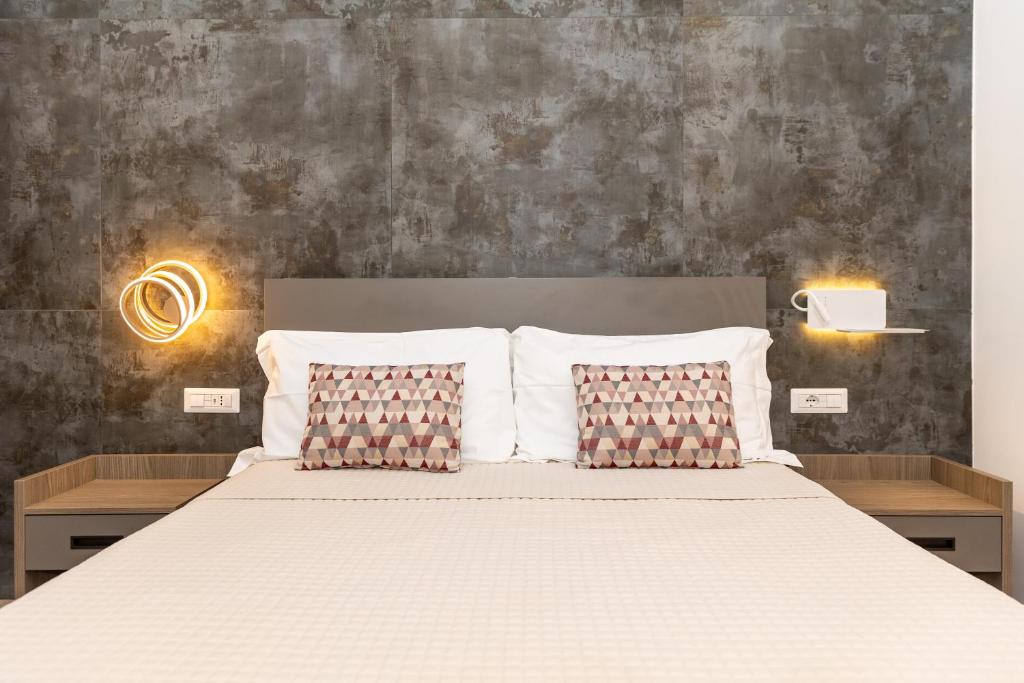 Postel nebo postele na pokoji v ubytování Patriziella 4 Rooms