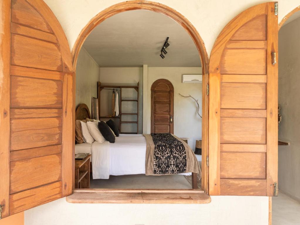 Postel nebo postele na pokoji v ubytování Benção Hotel