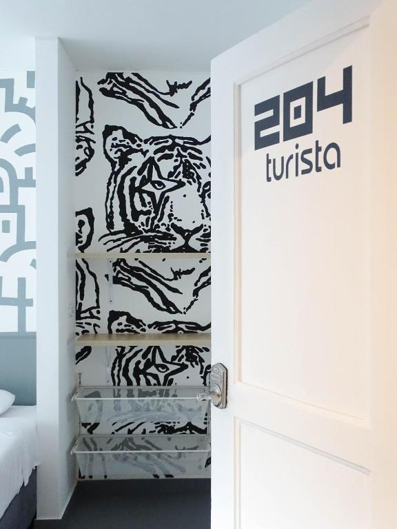 Postel nebo postele na pokoji v ubytování Nomadia Coliving Boutique