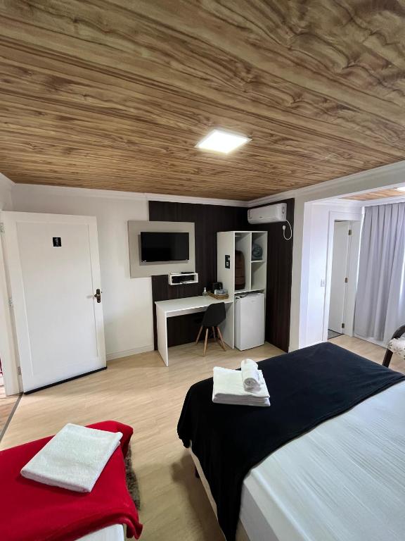 Postel nebo postele na pokoji v ubytování Pousada Kaki Haus