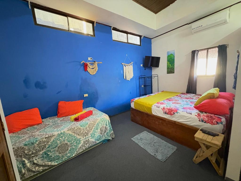 Postel nebo postele na pokoji v ubytování Passifloras Hostel