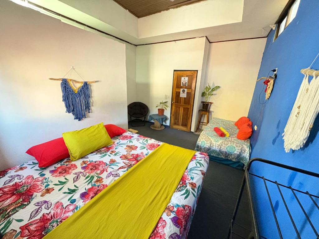 Postel nebo postele na pokoji v ubytování Passifloras Hostel