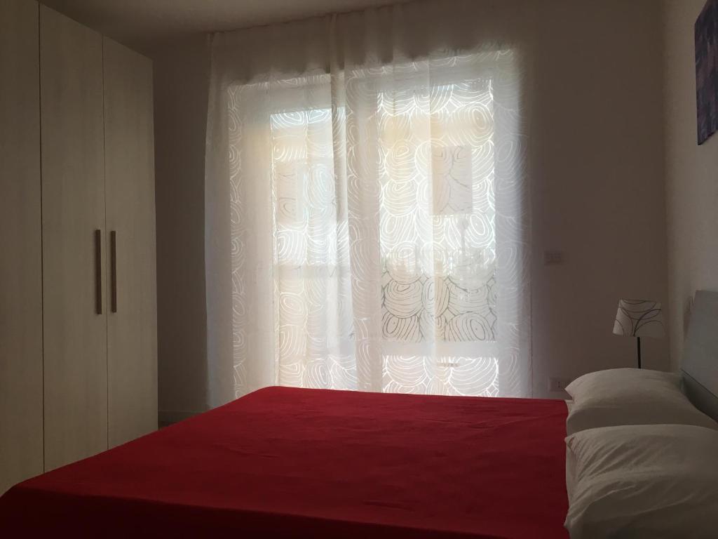 Postel nebo postele na pokoji v ubytování Appartamenti Stella Del Mare