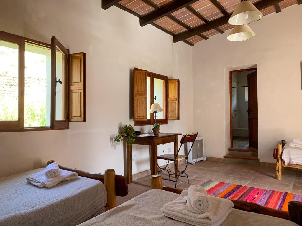 Postel nebo postele na pokoji v ubytování Terra - Casa de Campo