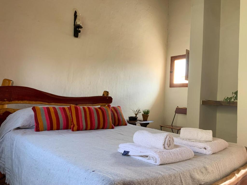 Postel nebo postele na pokoji v ubytování Terra - Casa de Campo