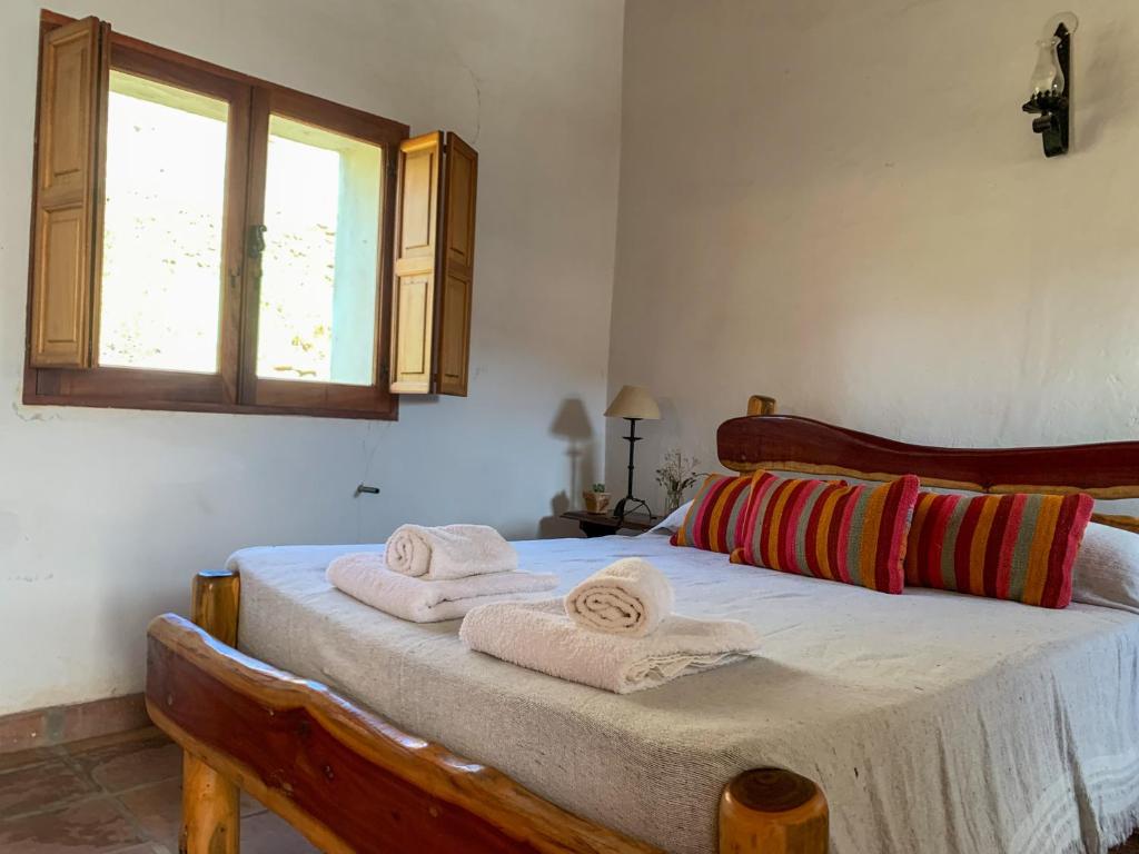 Postel nebo postele na pokoji v ubytování Terra - Casa de Campo