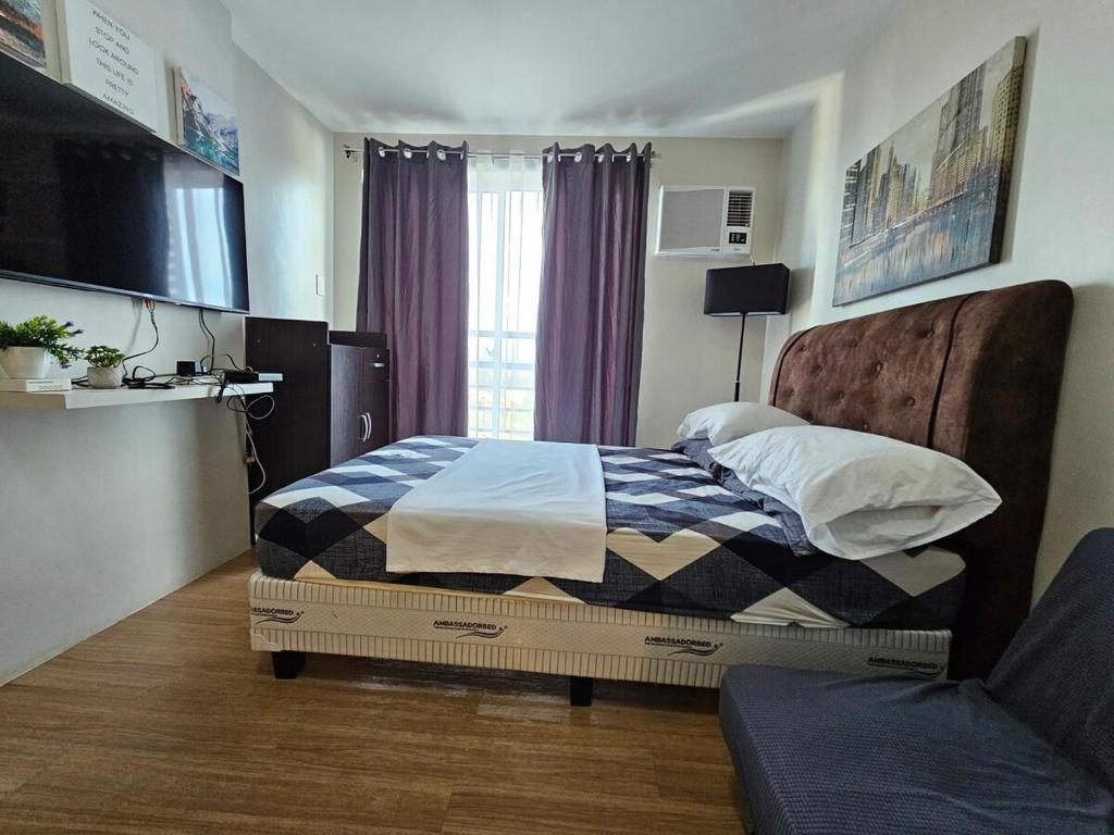 Postel nebo postele na pokoji v ubytování The Loop 2203 - Goff's Place