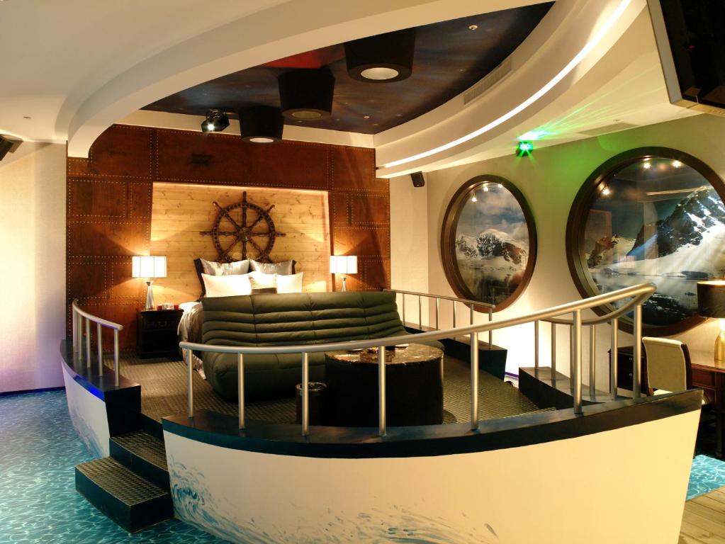 Postel nebo postele na pokoji v ubytování Discovery Motel - Zhonghe