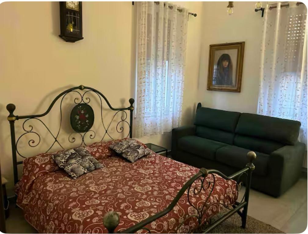 Postel nebo postele na pokoji v ubytování Stanza matrimoniale x2