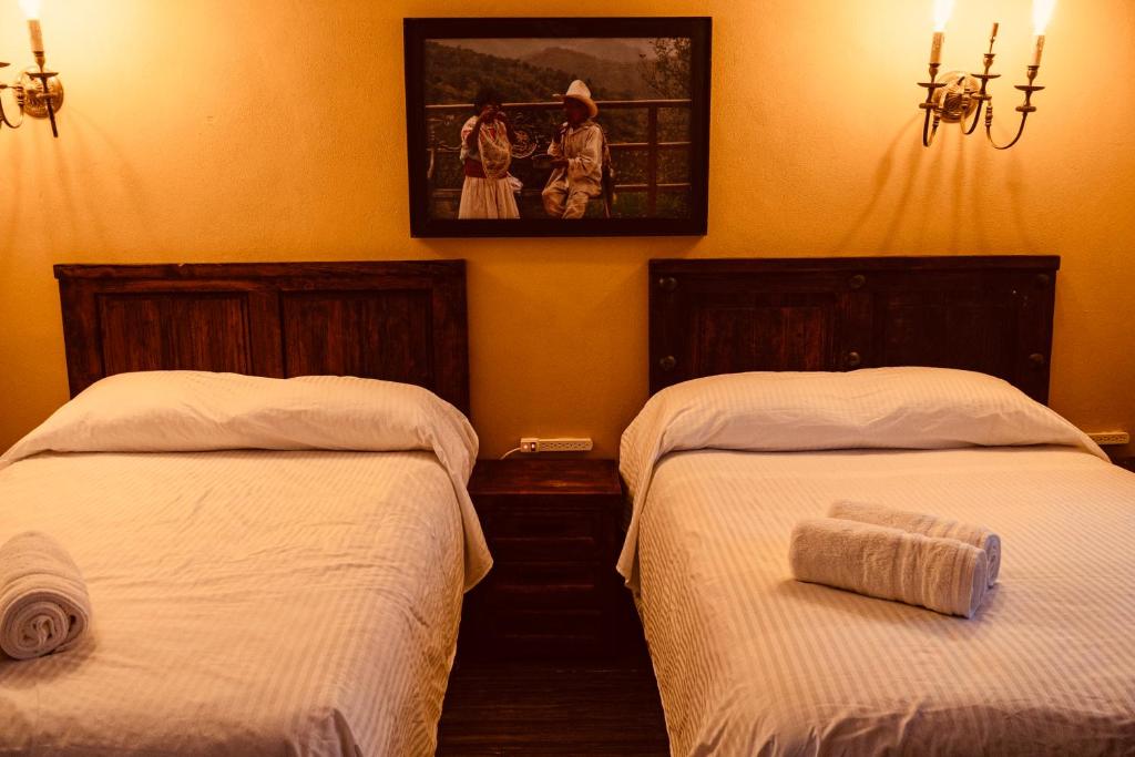 Letto o letti in una camera di Hotel Estancia 1928