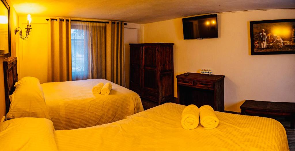 Letto o letti in una camera di Hotel Estancia 1928