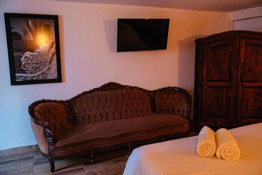 Letto o letti in una camera di Hotel Estancia 1928