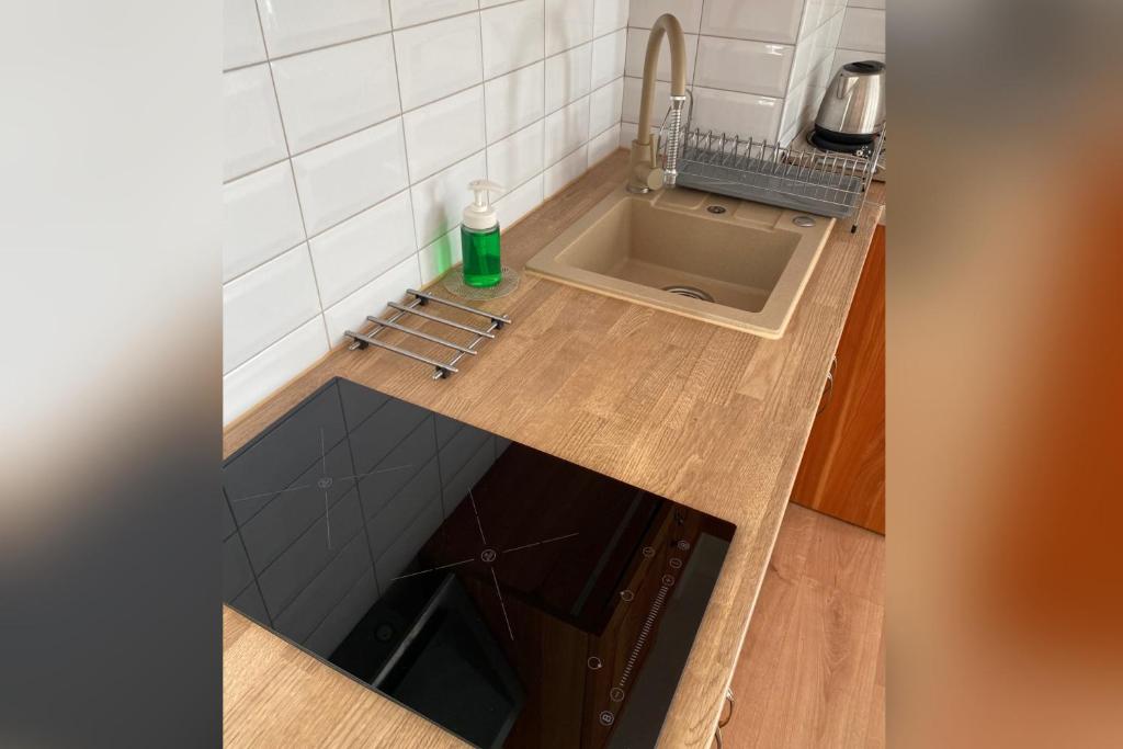 Kuchyňa alebo kuchynka v ubytovaní Apartamenty nad Potokiem Aneta Burliga