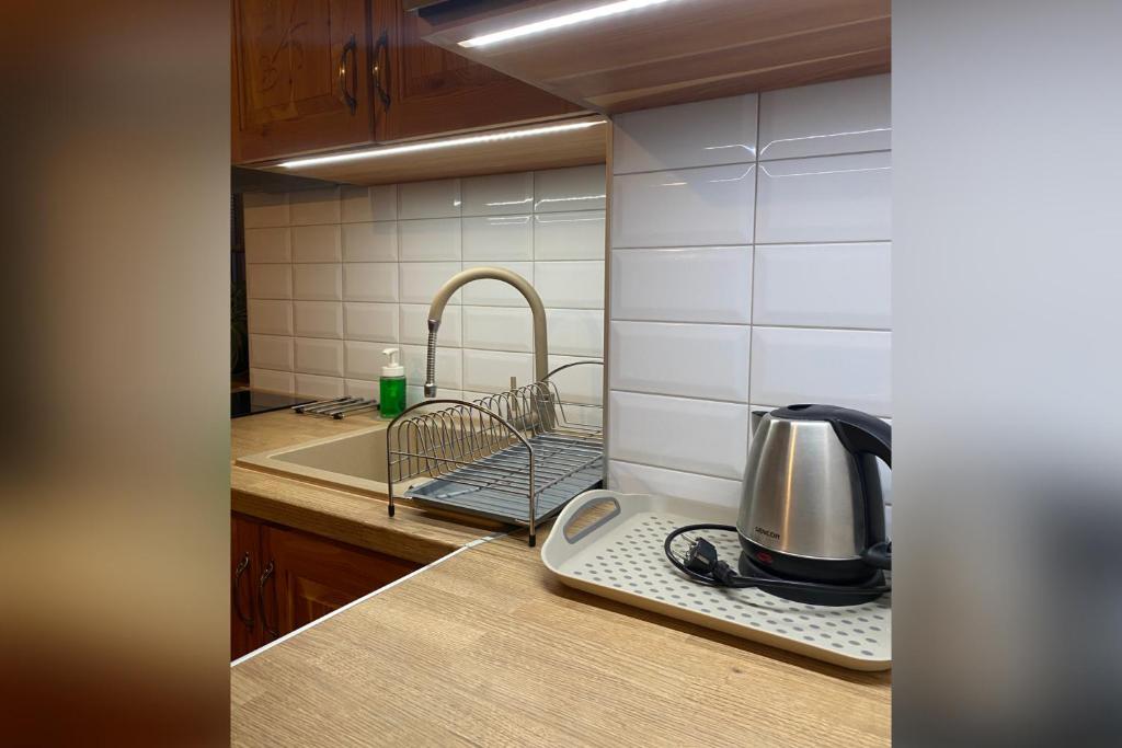 Kuchyňa alebo kuchynka v ubytovaní Apartamenty nad Potokiem Aneta Burliga