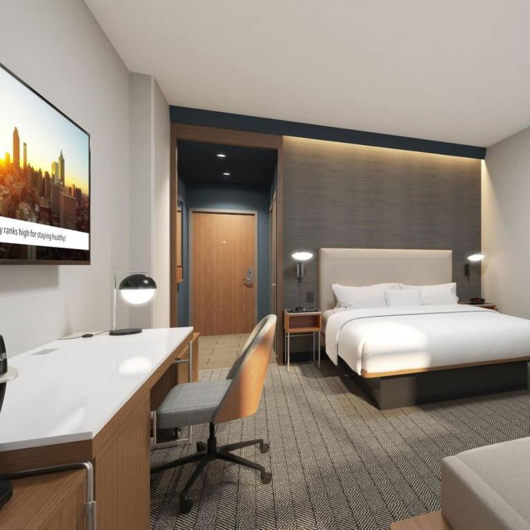 Postel nebo postele na pokoji v ubytování Courtyard by Marriott Bettendorf