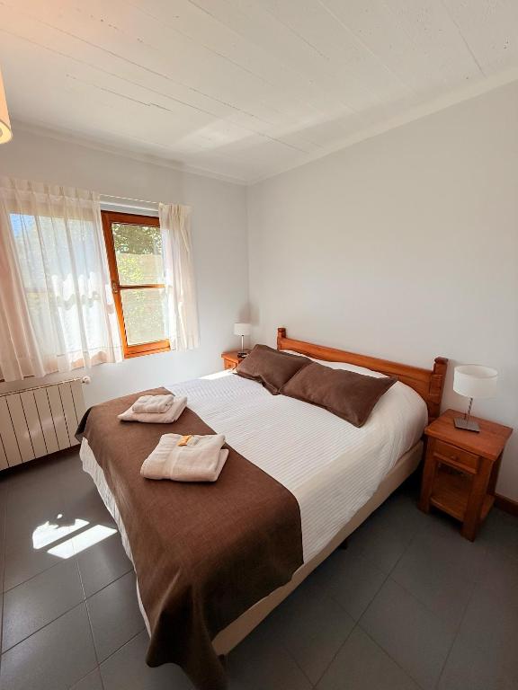Postel nebo postele na pokoji v ubytování Hostería Bärenhaus