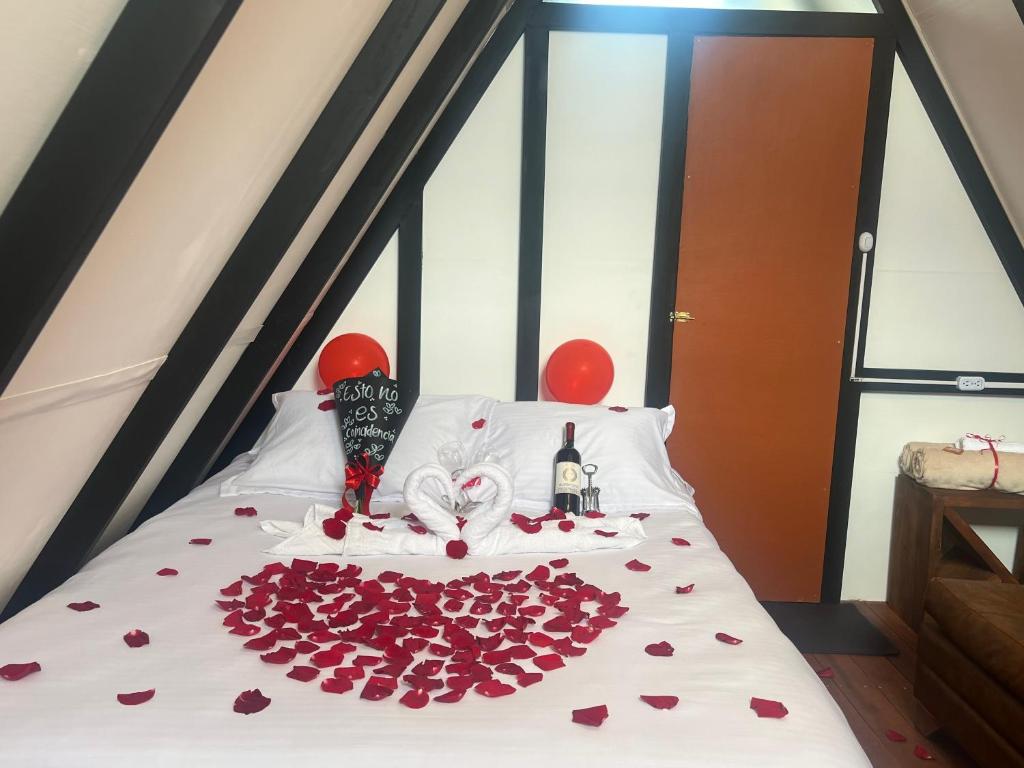 Postel nebo postele na pokoji v ubytování Villa Minta Cabañas