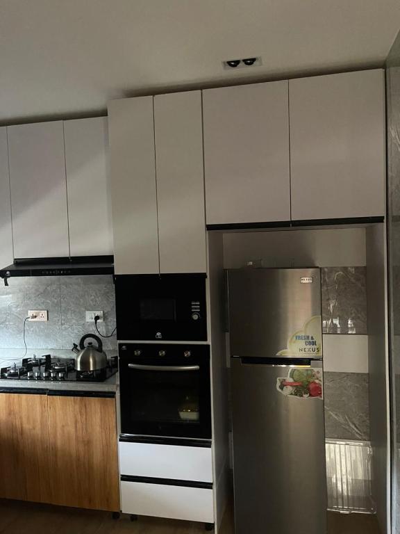 Kuchyň nebo kuchyňský kout v ubytování Sujimoto Residences MacDonald