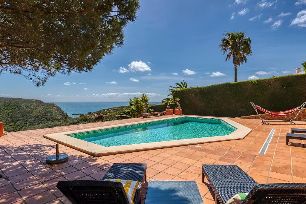 Πισίνα στο ή κοντά στο Arrifana Ocean View Villa