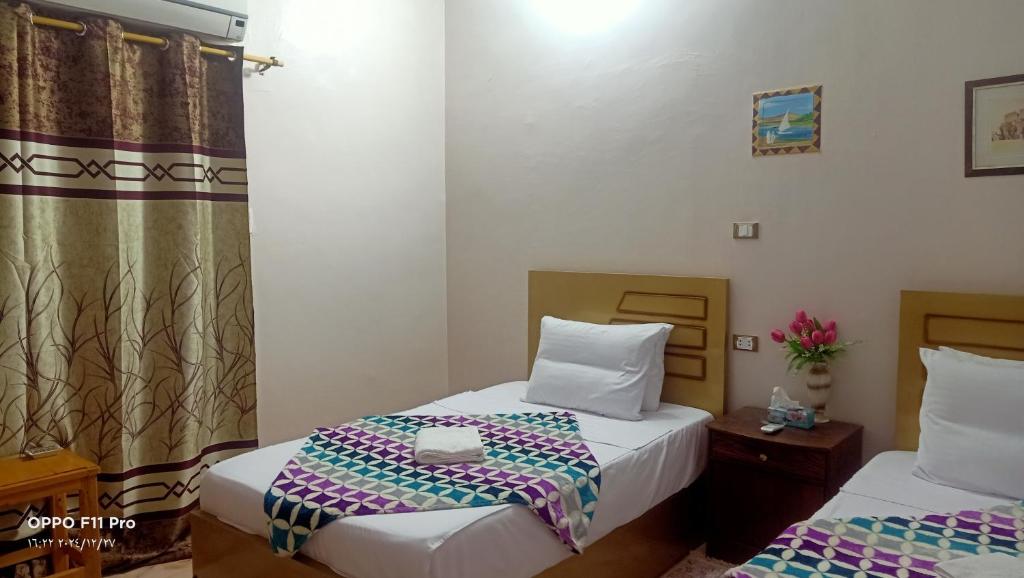 Postel nebo postele na pokoji v ubytování Amon guest house