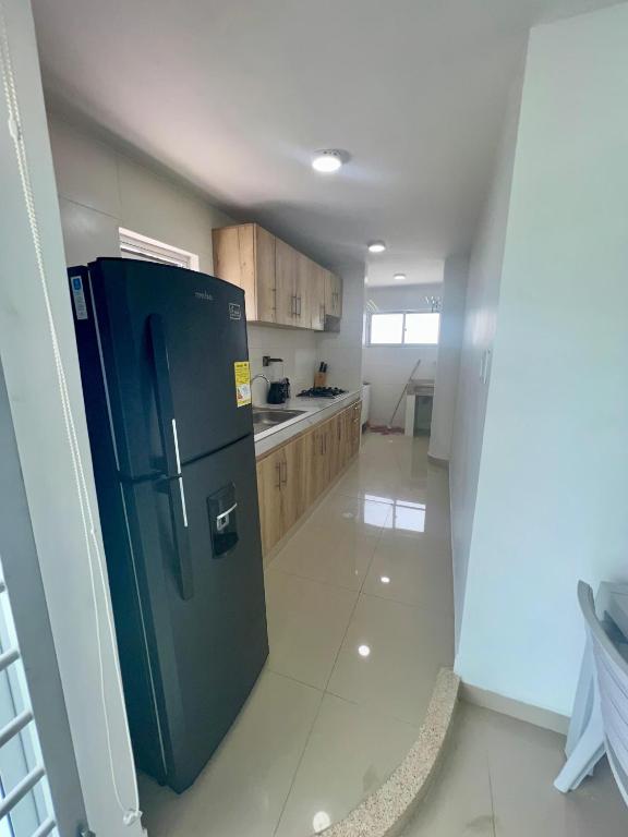 Kuchyň nebo kuchyňský kout v ubytování Apartamentos VIOLETTA