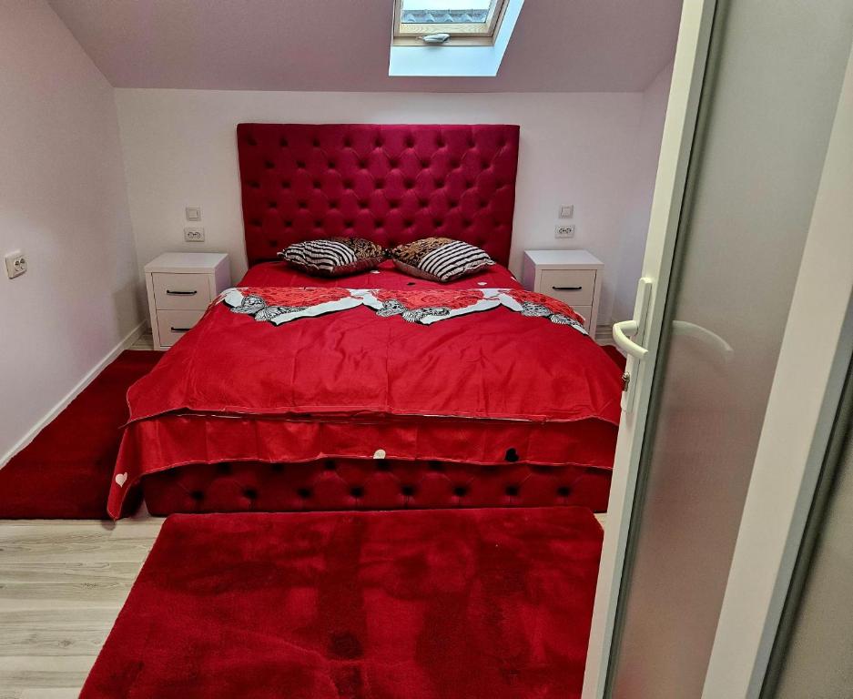 En eller flere senge i et værelse på Casa David