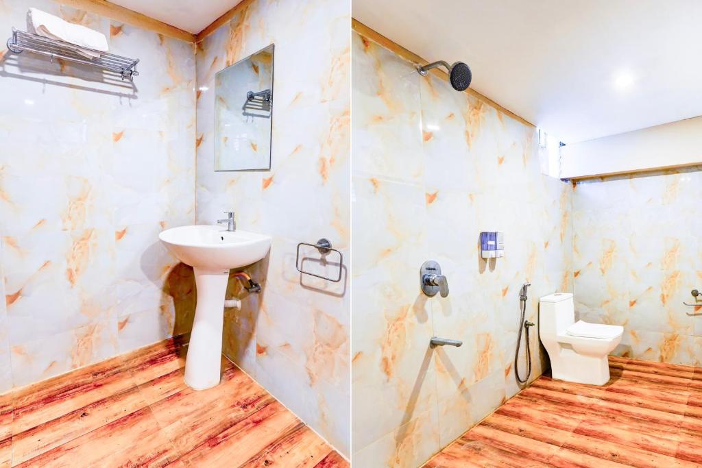 Koupelna v ubytování Super Hotel O Yazhini Inn