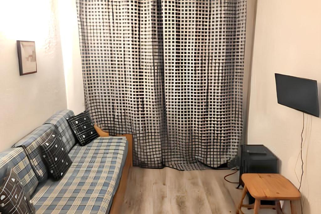 Posezení v ubytování Studio familial avec balcon à Modane 18 m² vue montagne
