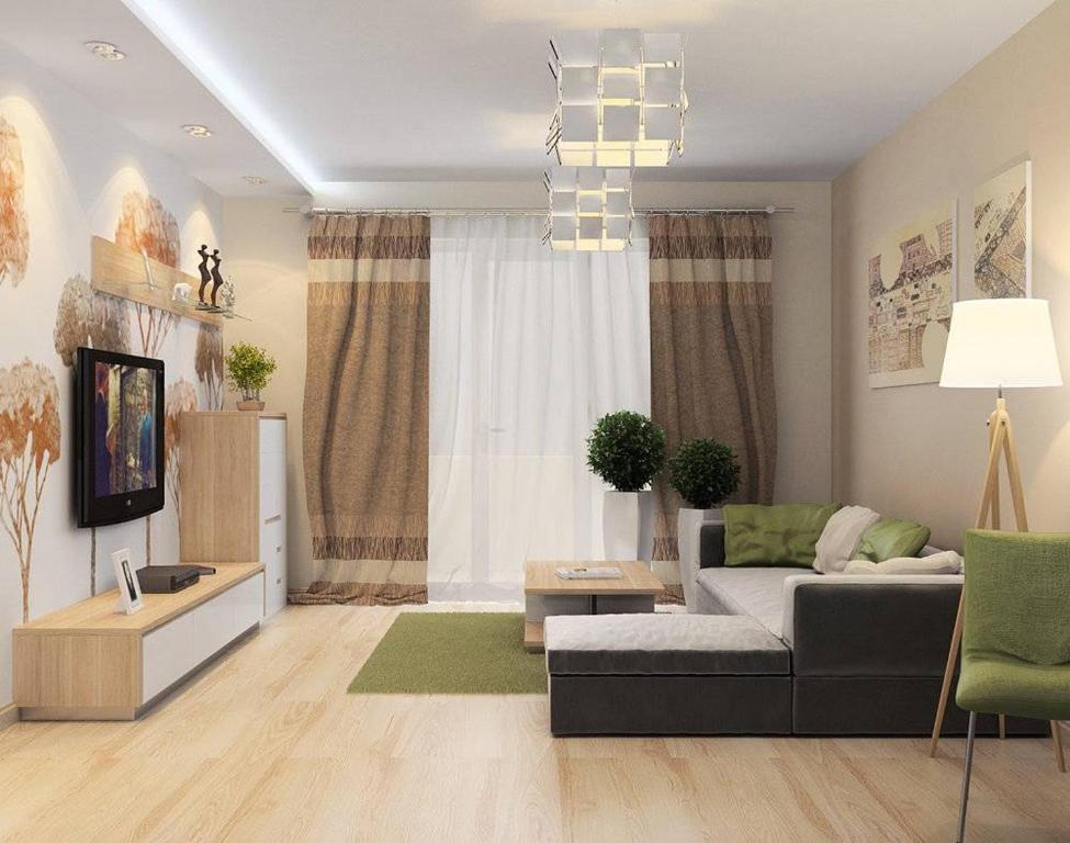 a living room with a couch and a tv at Apartment on Leylek in Baku