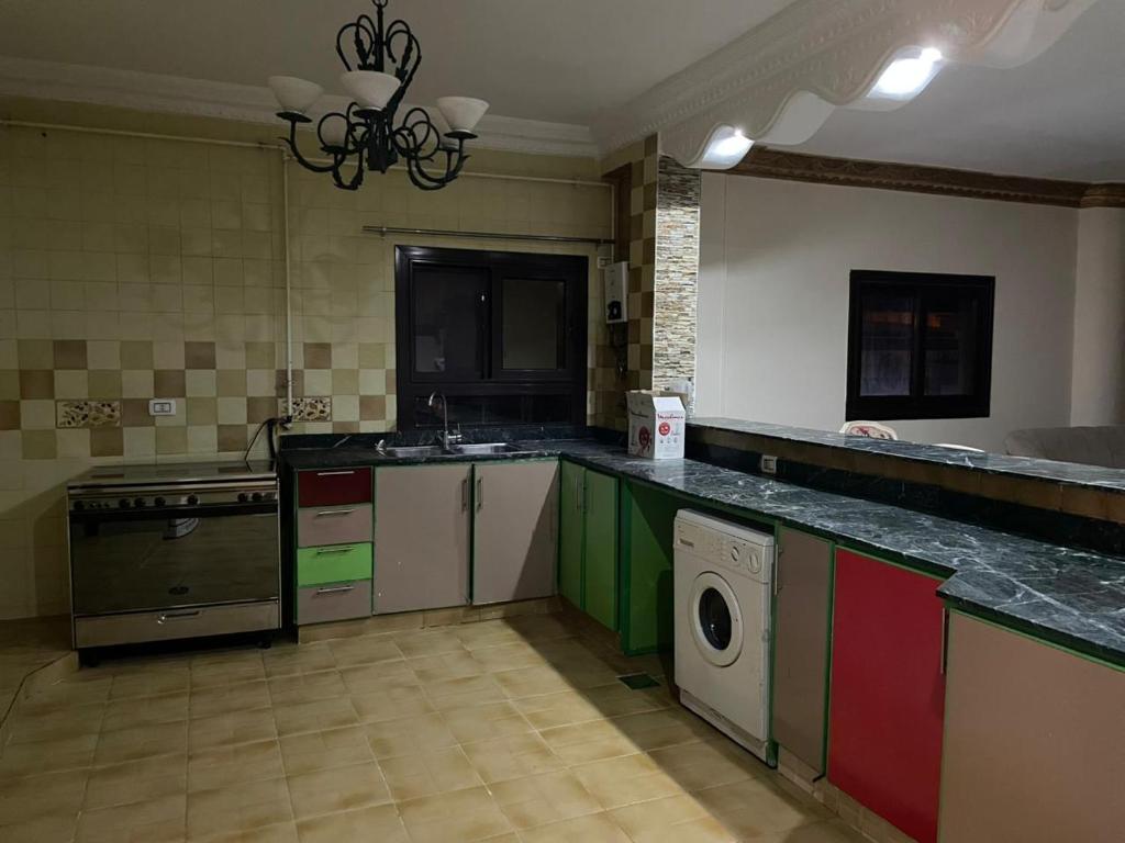 Kuchyň nebo kuchyňský kout v ubytování Cool appartement in a family house