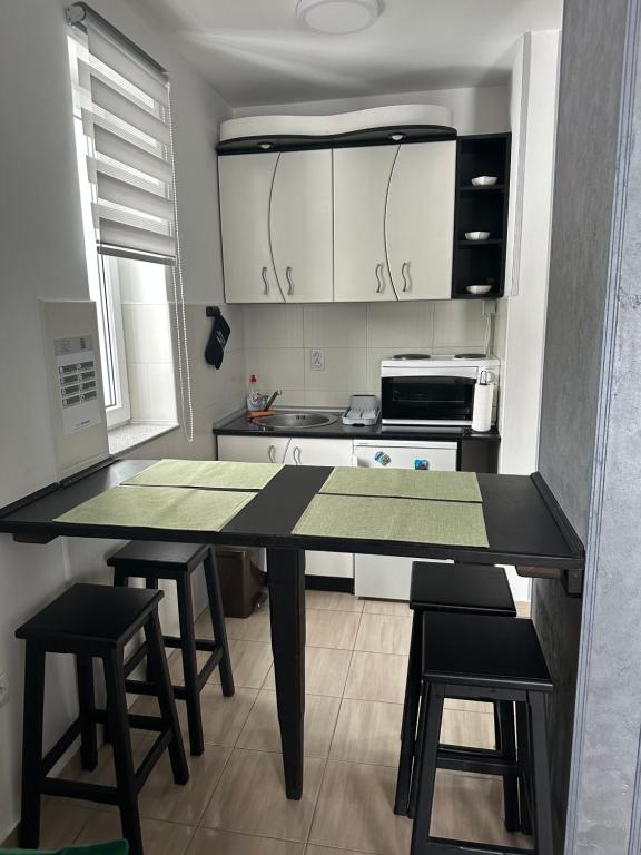 Una cocina o cocineta en Apartman Blagojevic