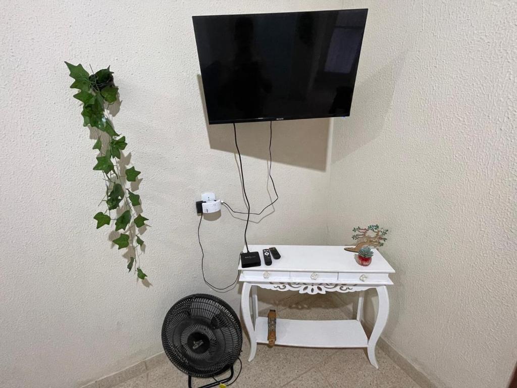TV a/nebo společenská místnost v ubytování Minicasa Refúgio da Serra