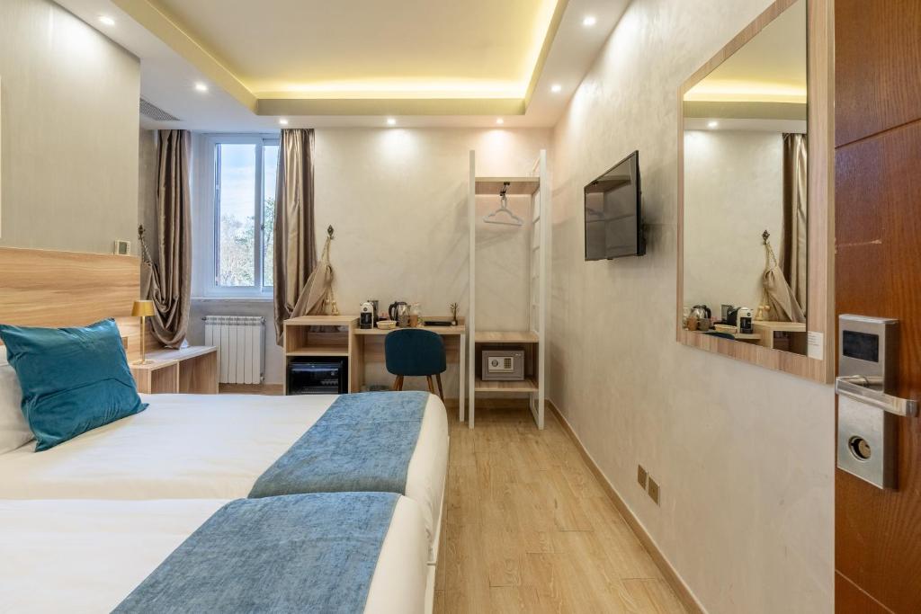 Postel nebo postele na pokoji v ubytování Rome Love Hotel