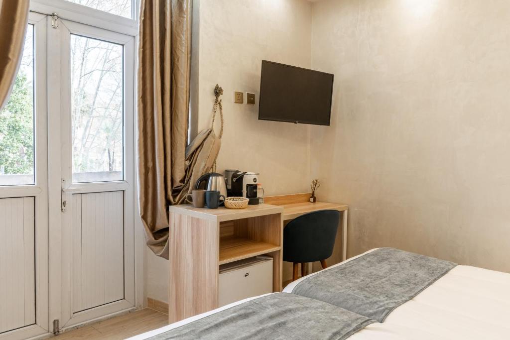 Postel nebo postele na pokoji v ubytování Rome Love Hotel
